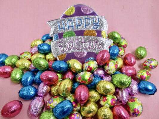 colorful stack of premium chocolate foiled Easter Eggs