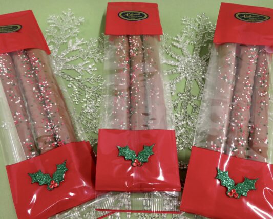 # pack of festively decorated Holiday Pretzel Rods