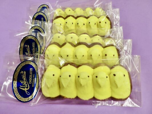 Rows of Marshmallow Peeps with Muddy chocolate feet