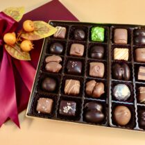 Premium Collection of Artisan Chocolates with Fall Decor.