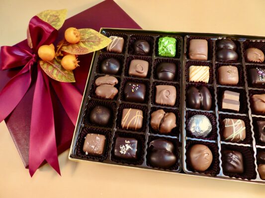 Premium Collection of Artisan Chocolates with Fall Decor.