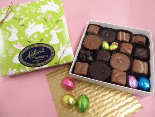 Collection of artisan peanut butter chocolates in a festive bunny box